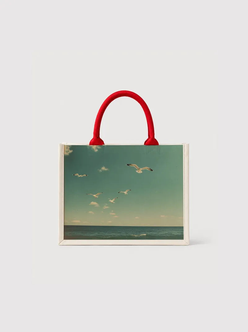 Seagulls flying in the sky Canvas Bag