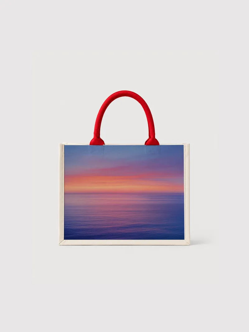 Ocean at dawn Canvas Bag