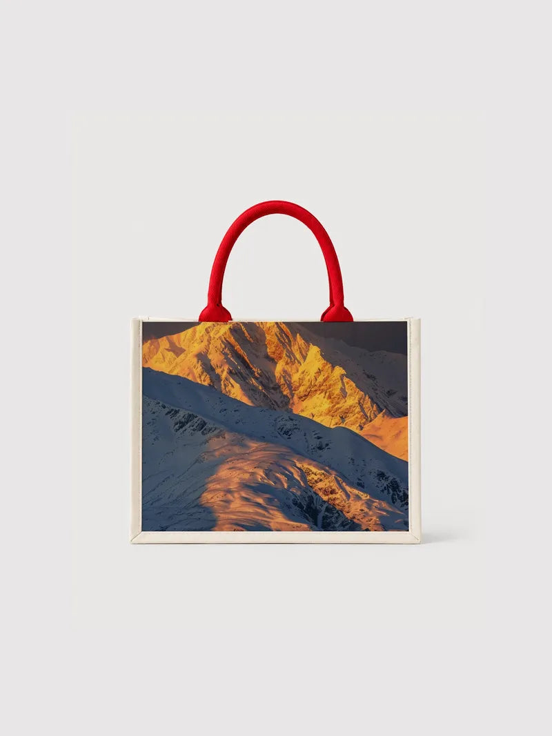 A Series of Golden Sunlight Shining on the Mountain Ranges Canvas Bag