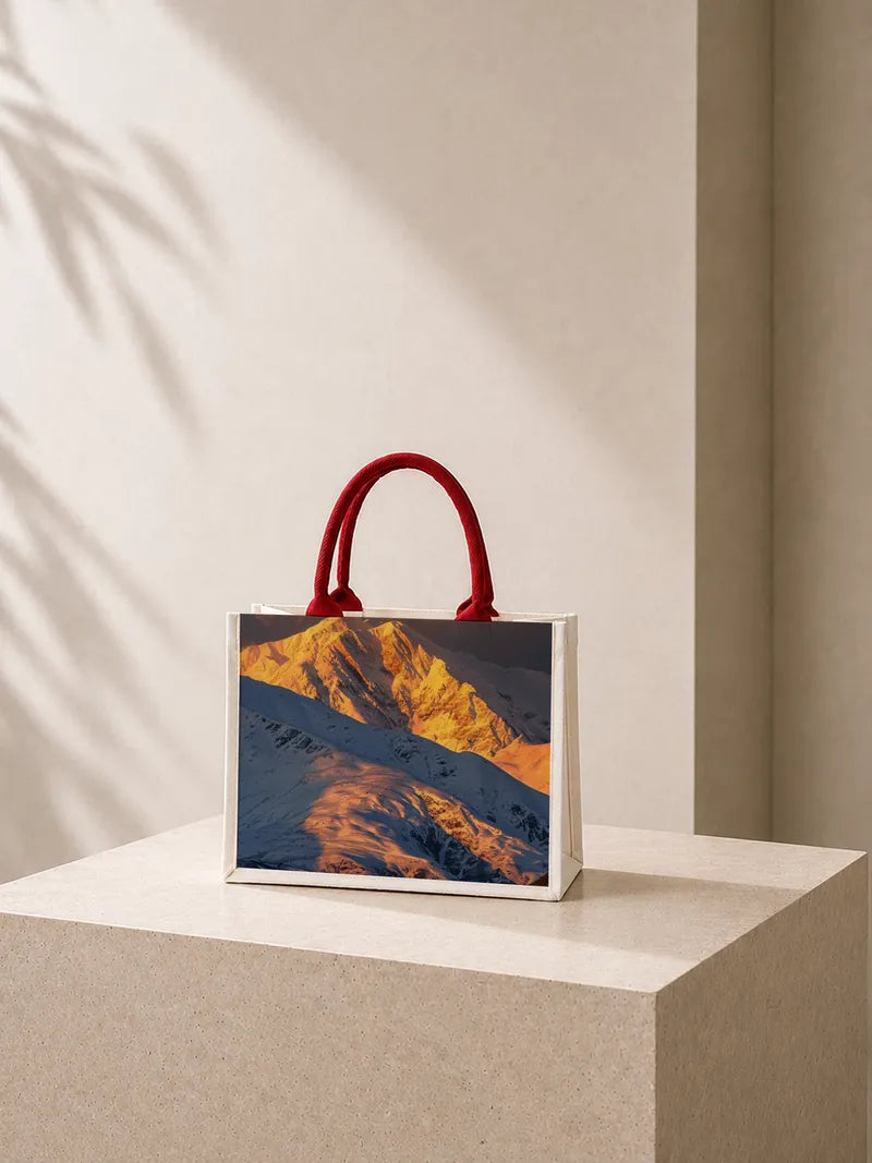 A Series of Golden Sunlight Shining on the Mountain Ranges Canvas Bag